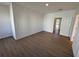 A bright bedroom features laminate flooring and large closet at 1213 S Station Pl # 404, Orlando, FL 32827