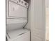 Modern stacked washer and dryer for space-saving convenience at 1213 S Station Pl # 404, Orlando, FL 32809