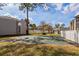 Community basketball court with green surface surrounded by trees and grass at 133 Springwood Cir # A, Longwood, FL 32750