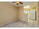 Bright dining area adjacent to kitchen, featuring tile floors and a ceiling fan at 133 Springwood Cir # A, Longwood, FL 32750