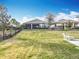 Expansive backyard of home with an iron fence at 1374 Zeek Ridge St, Clermont, FL 34715