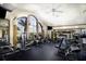 Spacious gym with modern exercise equipment and large windows offering natural light and great views of the community at 1374 Zeek Ridge St, Clermont, FL 34715