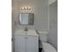 Modern bathroom featuring a vanity, mirror, and a toilet at 145 Zacalo Way, Kissimmee, FL 34743