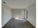 Bedroom with gray carpet, light colored walls and a closet with natural light at 145 Zacalo Way, Kissimmee, FL 34743