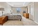 Comfortable bedroom featuring a neutral color scheme, carpet flooring, and plenty of natural light at 1558 Downy Birch Ln, Longwood, FL 32750