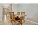 Cozy dining room showcasing a wooden table with chairs and neutral wall paint at 1558 Downy Birch Ln, Longwood, FL 32750