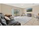 Living room with sliding glass doors that lead to the back at 1558 Downy Birch Ln, Longwood, FL 32750