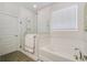 Bright bathroom with separate shower and tub, complemented by modern fixtures at 17858 Adrift Rd, Winter Garden, FL 34787