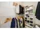 Well-organized walk-in closet with ample storage and clothing racks at 17858 Adrift Rd, Winter Garden, FL 34787