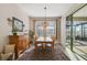 Cozy dining room with wooden table and chairs and sliding door access to the patio at 17858 Adrift Rd, Winter Garden, FL 34787