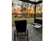 Enjoy the sunset views from this screened patio with pavers and space to entertain at 17858 Adrift Rd, Winter Garden, FL 34787