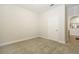 Empty room featuring neutral colored carpet and walls at 17858 Adrift Rd, Winter Garden, FL 34787