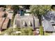 Aerial view of a home featuring a long rectangular pool and mature landscaping at 181 N Phelps Ave, Winter Park, FL 32789