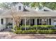 Charming two-story home featuring a welcoming front porch and well-maintained landscaping at 181 N Phelps Ave, Winter Park, FL 32789