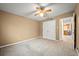 Bedroom featuring neutral walls, carpet flooring, and a closet at 198 Benjamin Dr, Ormond Beach, FL 32176