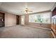 Cozy living room featuring large windows and neutral decor at 198 Benjamin Dr, Ormond Beach, FL 32176