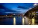 Waterfront at twilight with a view of a bridge, gazebo, and city buildings at 198 Benjamin Dr, Ormond Beach, FL 32176