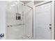 Modern walk-in shower with glass door and tiled floor at 203 E Sweetwater Creek Dr, Longwood, FL 32779