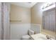 Bathroom with a toilet, sink and shower/tub combination at 2811 Curry Woods Dr, Orlando, FL 32822