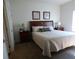 Comfortable bedroom with neutral tones, stylish decor, and ample natural light at 2903 Edenshire Way # 108, Kissimmee, FL 34746