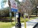 Onsite electric vehicle charging station and designated EV parking area at 2903 Edenshire Way # 108, Kissimmee, FL 34746