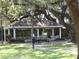 Community pavilion with picnic tables and a charcoal grill at 2903 Edenshire Way # 108, Kissimmee, FL 34746