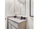 Clean bathroom featuring a granite countertop vanity, offering a simple and practical design for everyday use at 2987 Brie Hammock Bnd, St Cloud, FL 34773