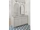 Stylish bathroom featuring double vanity and intricate tile flooring at 3011 Amherst Ave, Orlando, FL 32804