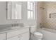 Well-lit bathroom features a tiled shower-over-bath and a single vanity at 3011 Amherst Ave, Orlando, FL 32804