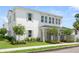 Beautiful two story exterior elevation with mature landscaping and covered entry at 3011 Amherst Ave, Orlando, FL 32804