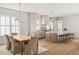 Spacious kitchen with an open dining area and a large center island with seating at 3011 Amherst Ave, Orlando, FL 32804