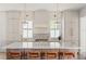 Stylish kitchen with a white tile backsplash, stainless steel appliances, and custom cabinetry at 3011 Amherst Ave, Orlando, FL 32804