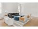 Bright living room with ample seating and natural light at 3011 Amherst Ave, Orlando, FL 32804