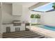 Outdoor kitchen and barbecue area create an ideal space for entertaining at 3011 Amherst Ave, Orlando, FL 32804