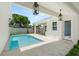Backyard pool and covered patio enhances outdoor living and entertaining at 3011 Amherst Ave, Orlando, FL 32804