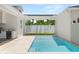 Backyard pool with an outdoor grilling area for relaxing and entertaining at 3011 Amherst Ave, Orlando, FL 32804