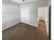 Neutral bedroom with closet, ceiling fan, carpet and a doorway leading to the bathroom at 3447 Astoria Ct, Winter Park, FL 32792