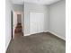 Neutral bedroom features carpeted floor, a double door closet and is freshly painted at 3447 Astoria Ct, Winter Park, FL 32792