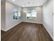 Dining room features wood-look flooring, neutral walls, and stylish globe pendant lighting at 3447 Astoria Ct, Winter Park, FL 32792