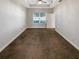 Empty Main bedroom with neutral walls, tray ceiling, and cozy carpet at 3447 Astoria Ct, Winter Park, FL 32792