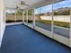 Enclosed patio overlooking backyard at 3447 Astoria Ct, Winter Park, FL 32792