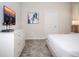 Bedroom featuring a dresser and a mounted television at 351 Ocean Course Ave, Davenport, FL 33896