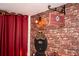 Themed bedroom boasts Hogwarts Express details, including a 9 3/4 sign, brick accents, and cozy lighting at 351 Ocean Course Ave, Davenport, FL 33896