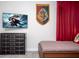 Themed bedroom showcases a Harry Potter banner, a sleek dresser, and a cozy bed for a magical retreat at 351 Ocean Course Ave, Davenport, FL 33896