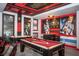 Spacious game room featuring a pool table and Star Wars themed decor at 351 Ocean Course Ave, Davenport, FL 33896