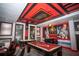 Large game room with a custom Star Wars themed ceiling, pool table, and games at 351 Ocean Course Ave, Davenport, FL 33896