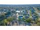 Aerial view of the community showcasing the homes, pond, and lush greenery of the surrounding neighborhood at 352 Radisson Pl, Oviedo, FL 32765