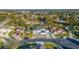 Aerial view of the property showing the house, driveway, landscaping, and surrounding neighborhood at 352 Radisson Pl, Oviedo, FL 32765