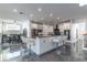 Modern kitchen with a large island, stainless steel appliances, and sleek white cabinetry at 352 Radisson Pl, Oviedo, FL 32765