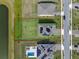 Aerial view of a property showing the layout with a pond and solar panels at 4228 Sunset Preserve Blvd, Orlando, FL 32820